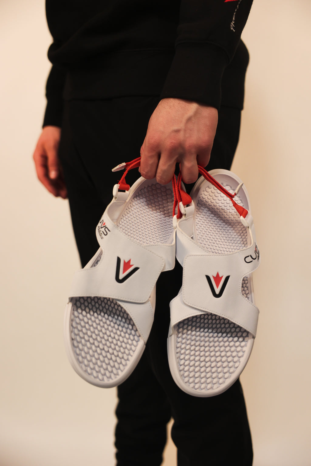 Track and field spike covers with massaging footbed